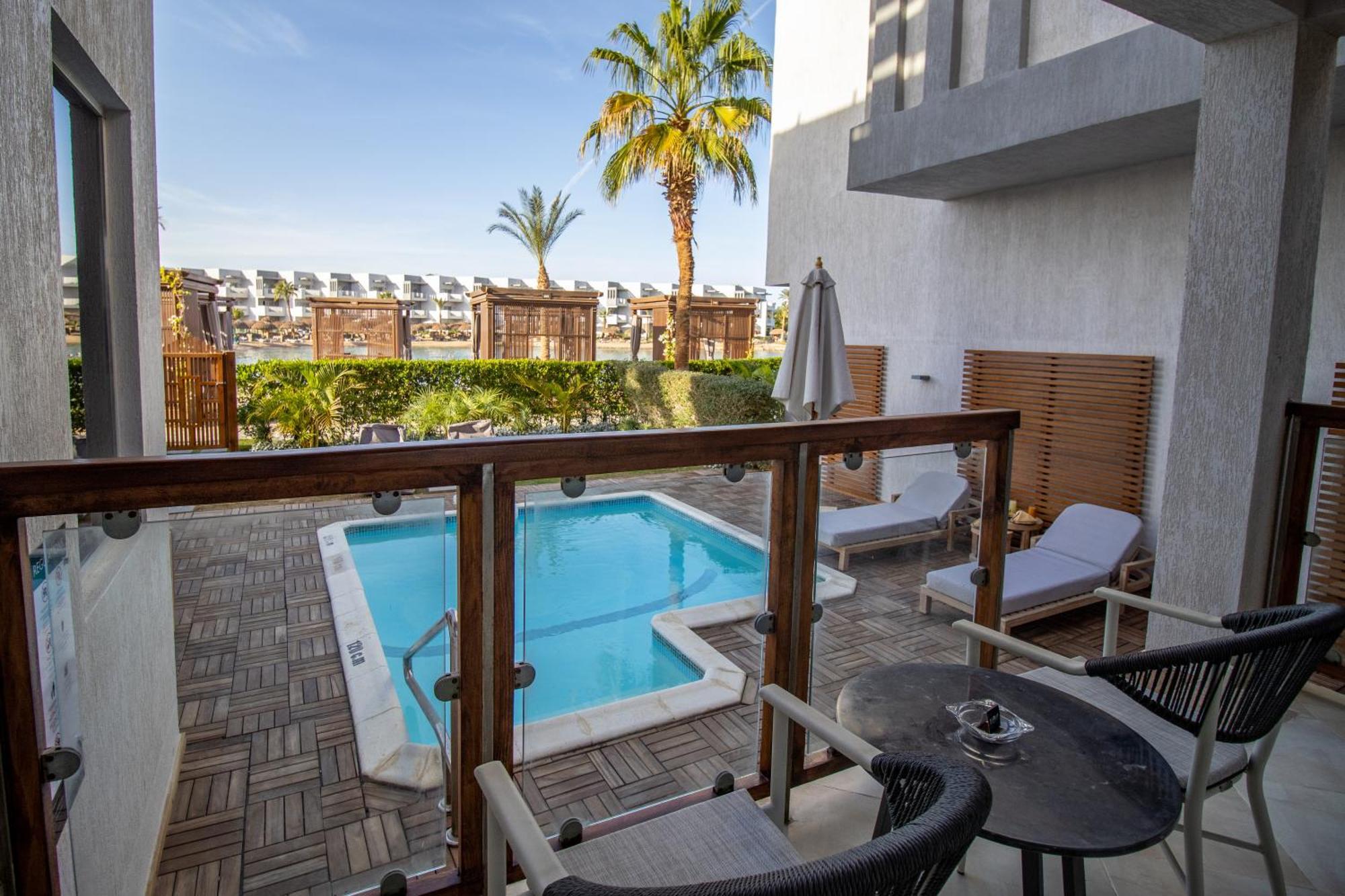 Sunrise Crystal Bay Resort -Grand Select (Adults Only) Hurghada Exterior photo A private pool at a hotel in Greece